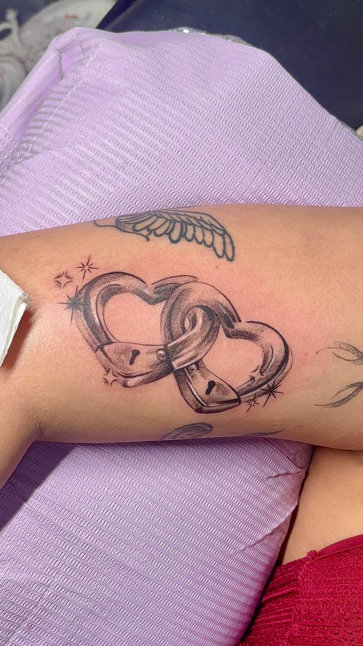 Heart locks fine line tattoo by Lydia